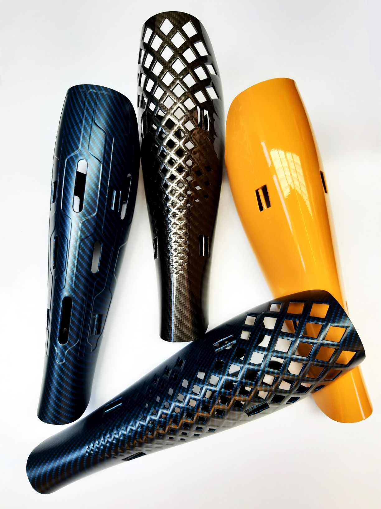 A bundle of leg covers in metallic navy and yellow with a pair of black vent covers